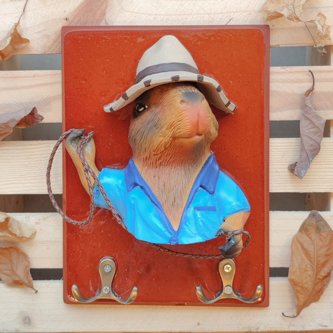 Perchero de capibara (chigüiro) azul